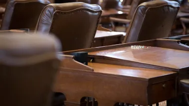 Empty seats inside the Texas Capitol building